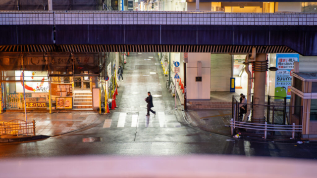 Japan5-Jan07-02 A pre-dawn shot of someone crossing a deserted street, Ueno, Tokyo
