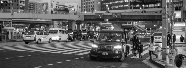 Japan5-Jan07-20 Taxi making a delivery outside Ueno Station, Tokyo